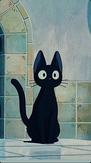 Shot from the Ghibli movie "Kiki's delivery service"
Shows the cat Jiji in front of a wall with tiles