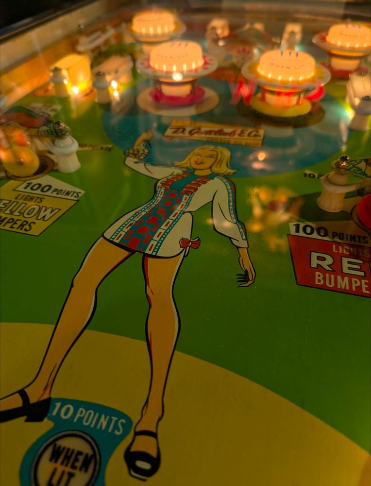 Playfield close up of a girl holding a marble.