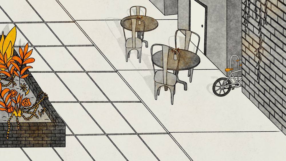 An illustration of an urban outdoor walking area. The ground is sidewalk and concrete. On the left there is a large brick planter filled with flowers and ferns and vines. On the right are two tables, each with two chairs and a flower sat on top, next to a few buildings. Two of the buildings have a bike rack with a bike situated between them. The whole image is in grey tones with some orange lighting. The plants and bike seat are colored orange as highlights. 