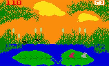 A screen shot of the IntelliVision video game Frog Bog. Two frogs sit on a lily pad on the right side of the screen, with another lily pad on the left. Black insects fly above them. The sky is orange with yellowish clouds, and plants and trees are in the background. The red frog is wining over the white frog, 110 to 50. 