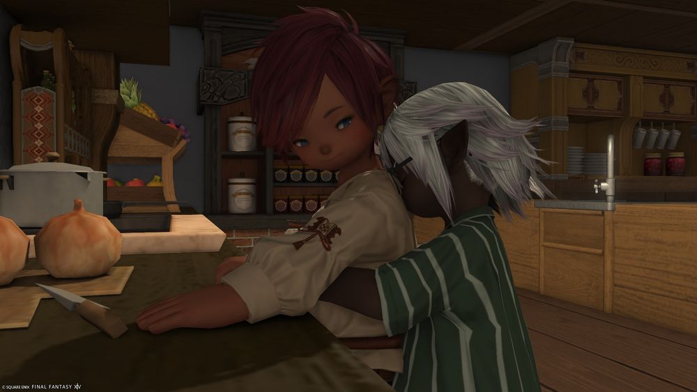 An earlier screenshot of Reliq and Nananji in the kitchen of their apartment (legitimately forgot I made this one).  Reliq is dressed in casual clothes and was in the middle of prepping breakfast.  Nananji has come down, still in his pajamas, and his giving Reliq a sleepy hug from behind.
