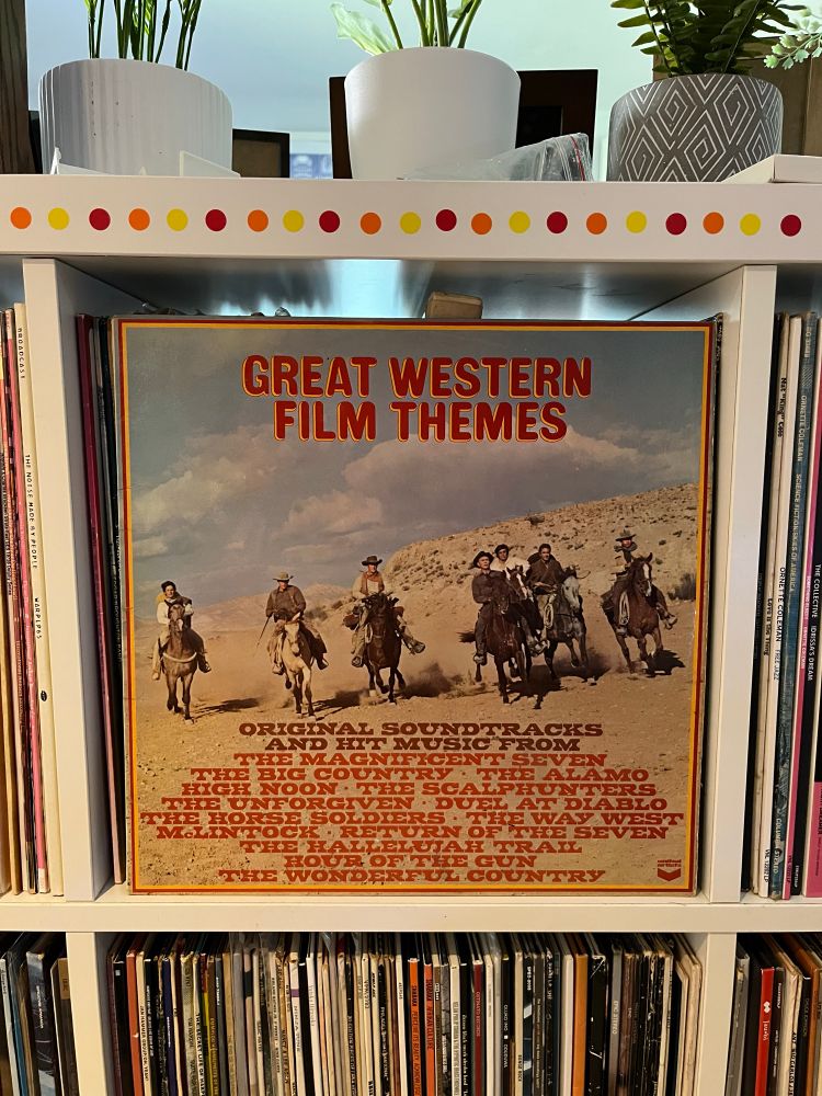 Album cover for ‘Great Western Film Themes’ featuring seven cowboys on horseback. It’s the Magnificent Seven but the ones from the sequel.