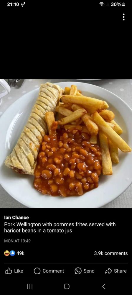 Pork wellington with pomme frites and a tomato jus.