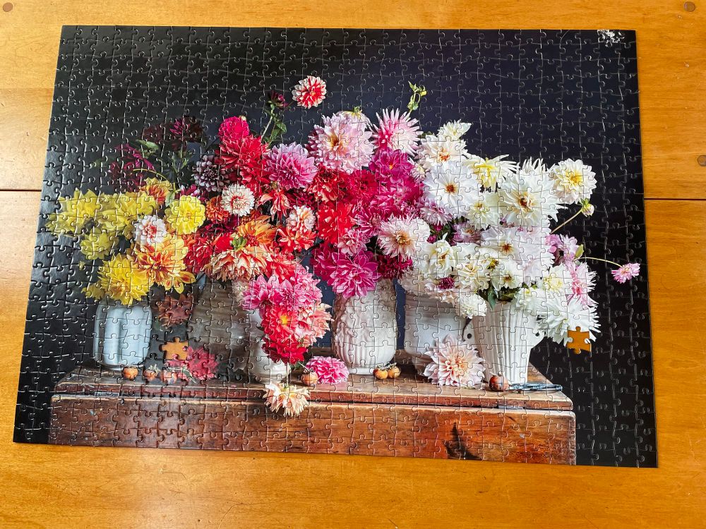 Puzzle with flowers in vases