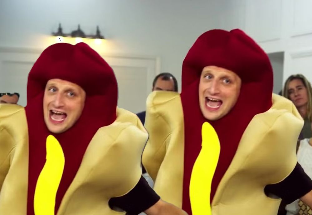 Two Tim Robinsons wearing a hot dog suit from the 