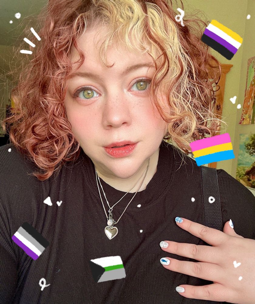 Selfie with varies doodles of flags on top: non-binary, pansexual, asexual, and demiromantic.