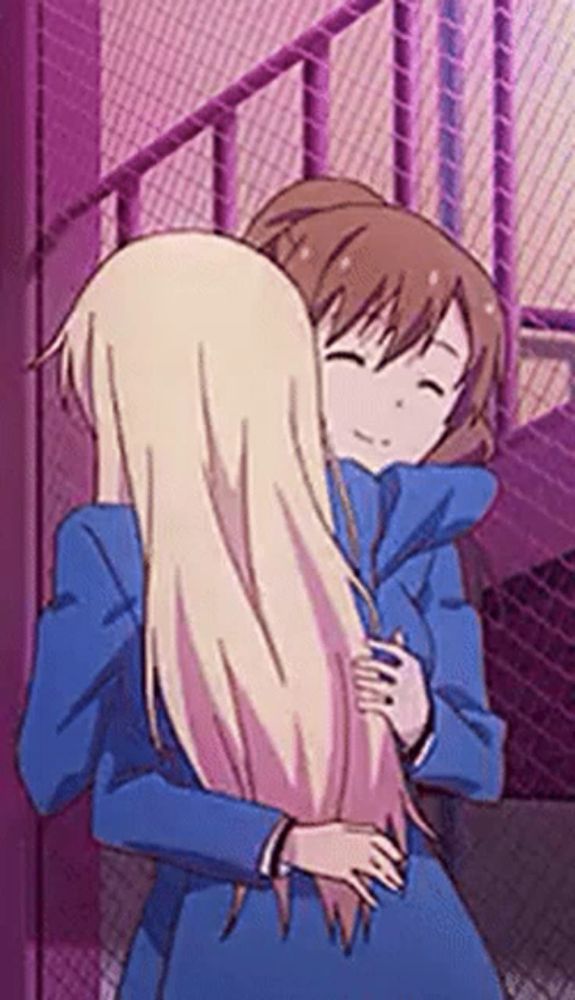 two anime girls are hugging each other in front of a purple fence .