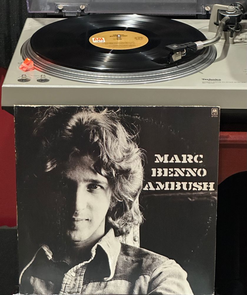Black and white Photo of Marc Benno , front profile. Album title is Ambush. 