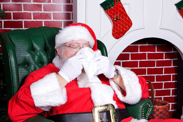 Santa Claus blowing his nose. "Honkin On Bobo" ha ha