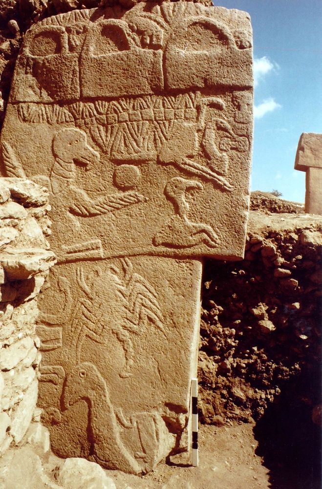 One of the recently-uncovered stelas, which our junior Videotape Archaeologists has been dispatched to study for further chronotemporal disturbances, and potentially ones we might know about as far as one whole day in advance.