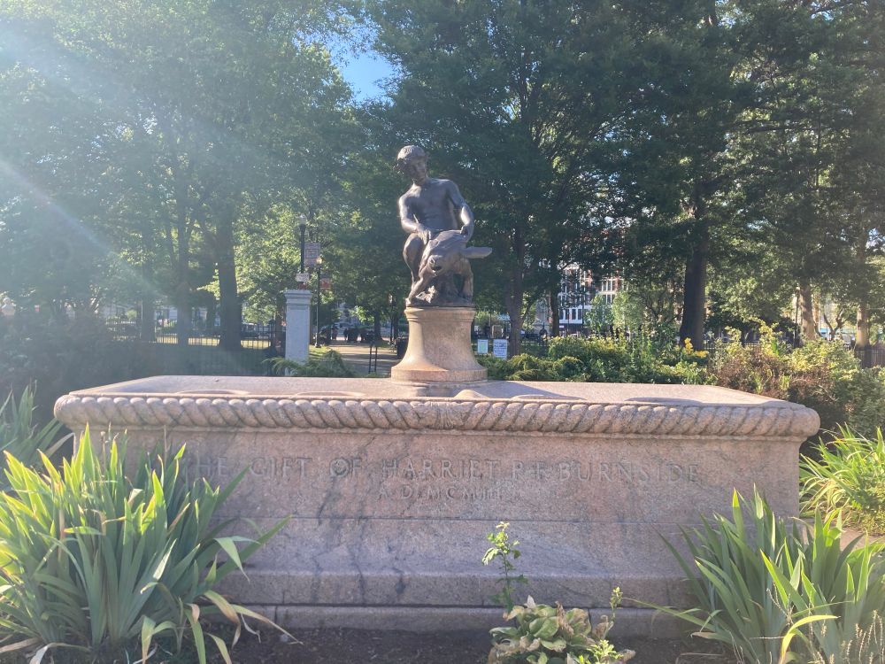 The Burnside Fountain- a fountain with a bronze statue of a boy riding a turtle.