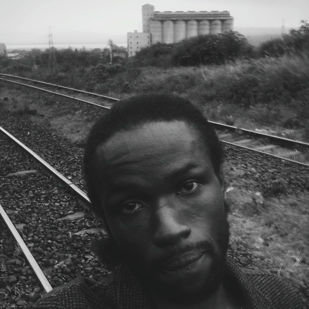 Power lines next to a factory in Africa 🌍 
Railway tracks for cargo
B&W edit 🎨