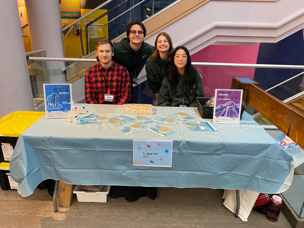 Undergraduate and graduate volunteer students pictured at some of the event stations at the Saskatchewan Science Center. 
