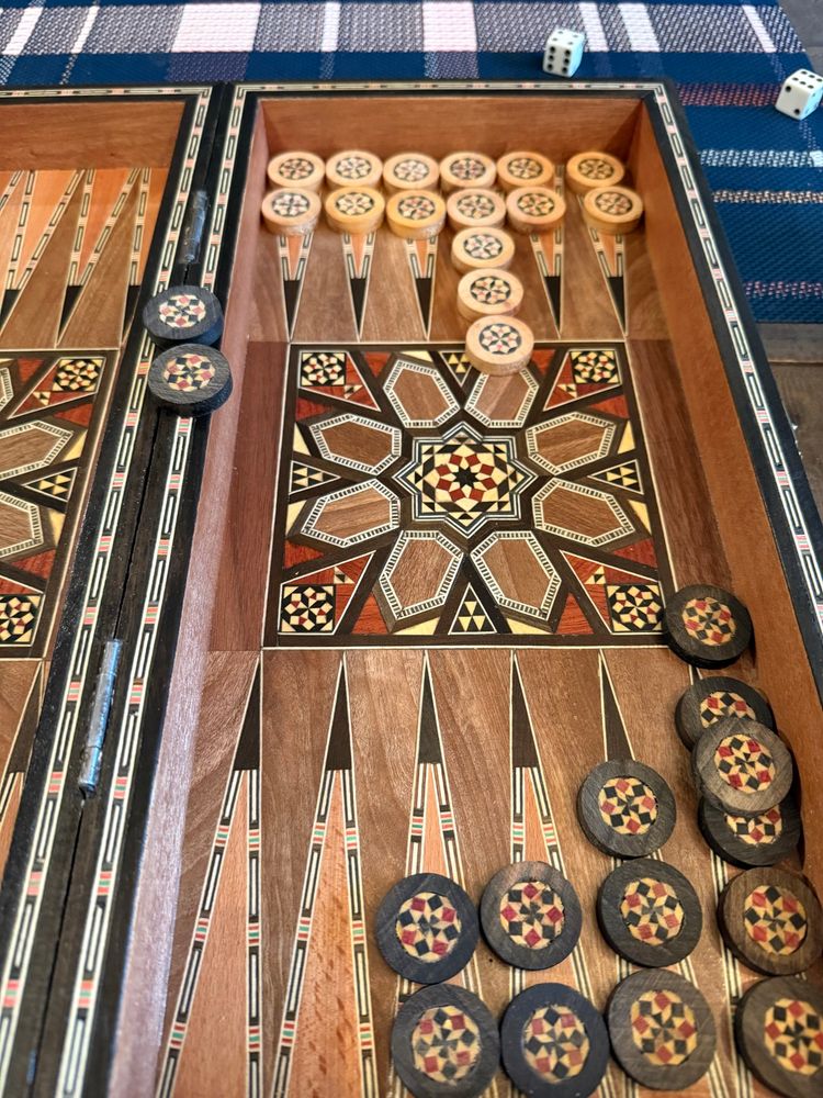 Emily losing bad in backgammon. 