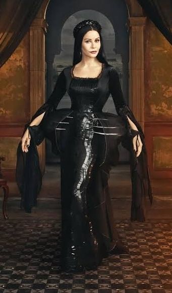 Catherine Zeta-Jones portraying Morticia Addams in one of THE most incredible dresses ughhhhh I burn I pine I perish

The pannier hoops the beadwork the chiffon details I simply cannot