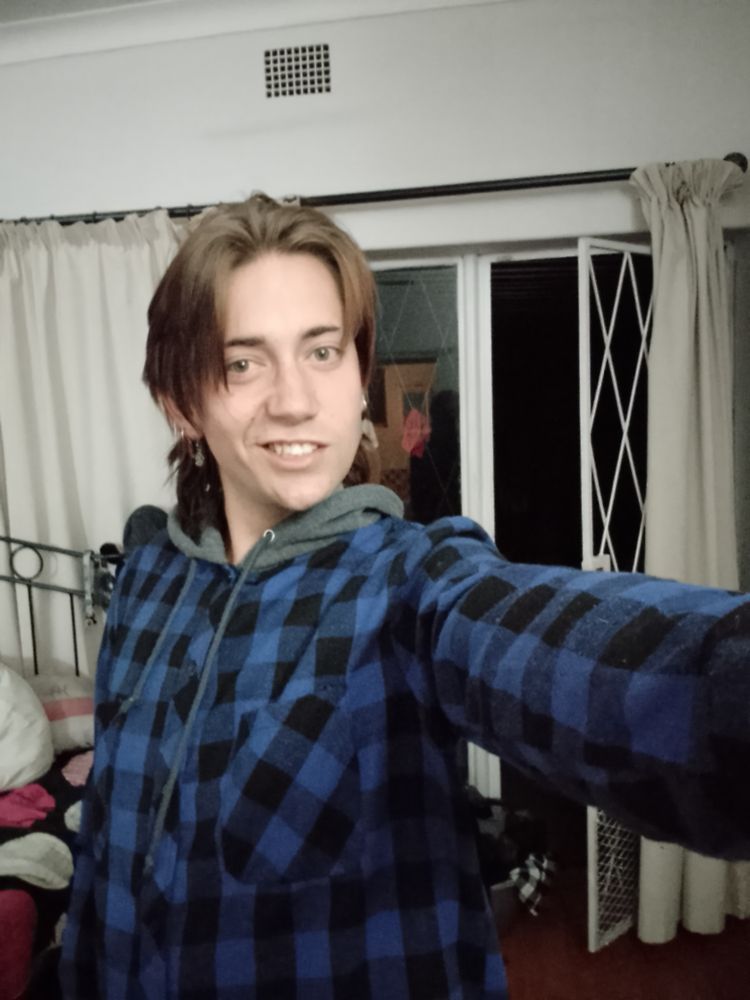 Me in a blue plead hoodie 
