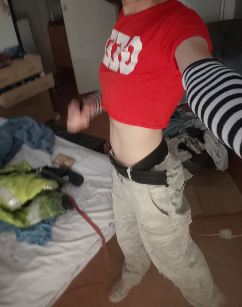 Me in a geek crop top, striped arm sleeves and snow camo pants.