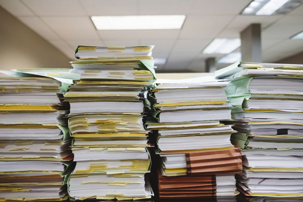 A pile of books and papers. Taken by Wesley Tingey.