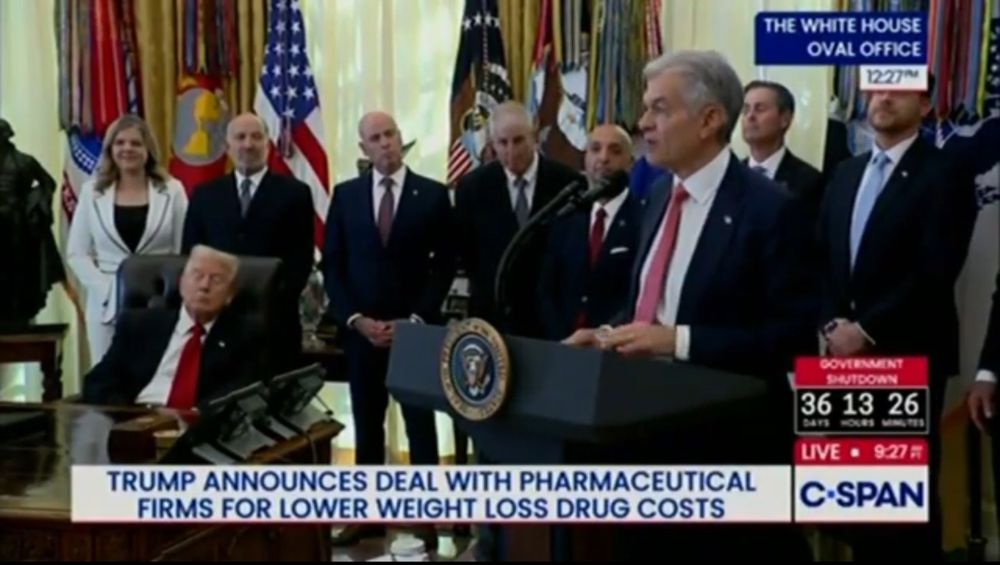 Trump asleep while someone speaking at lectern.