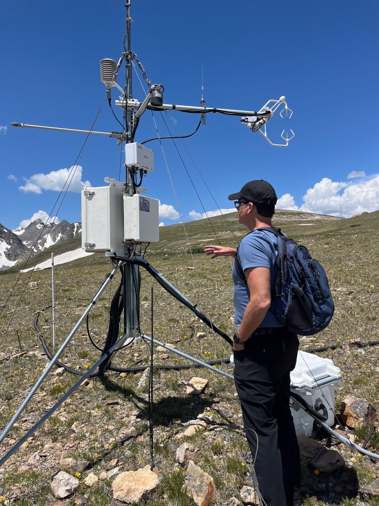 Andrew Mayock, CU Boulder's Vice Chancellor for Sustainability, checks out a climate monitoring station on Niwot Ridge, Colorado. Credit: Nicole Lovenduski.