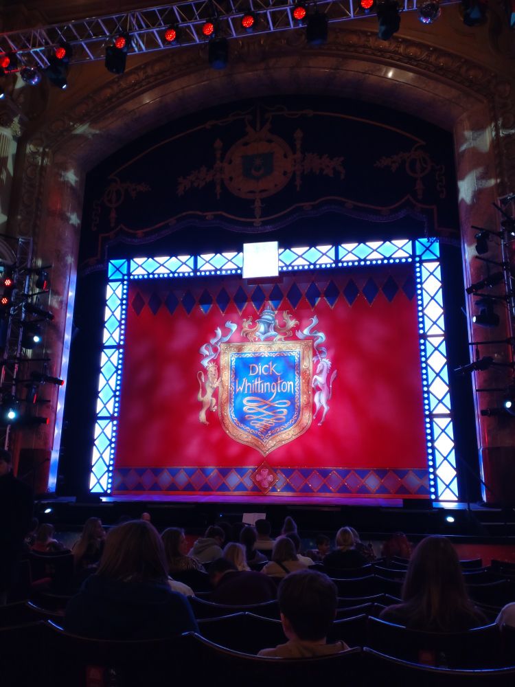 Dick Whittington stage curtain before the performance starts