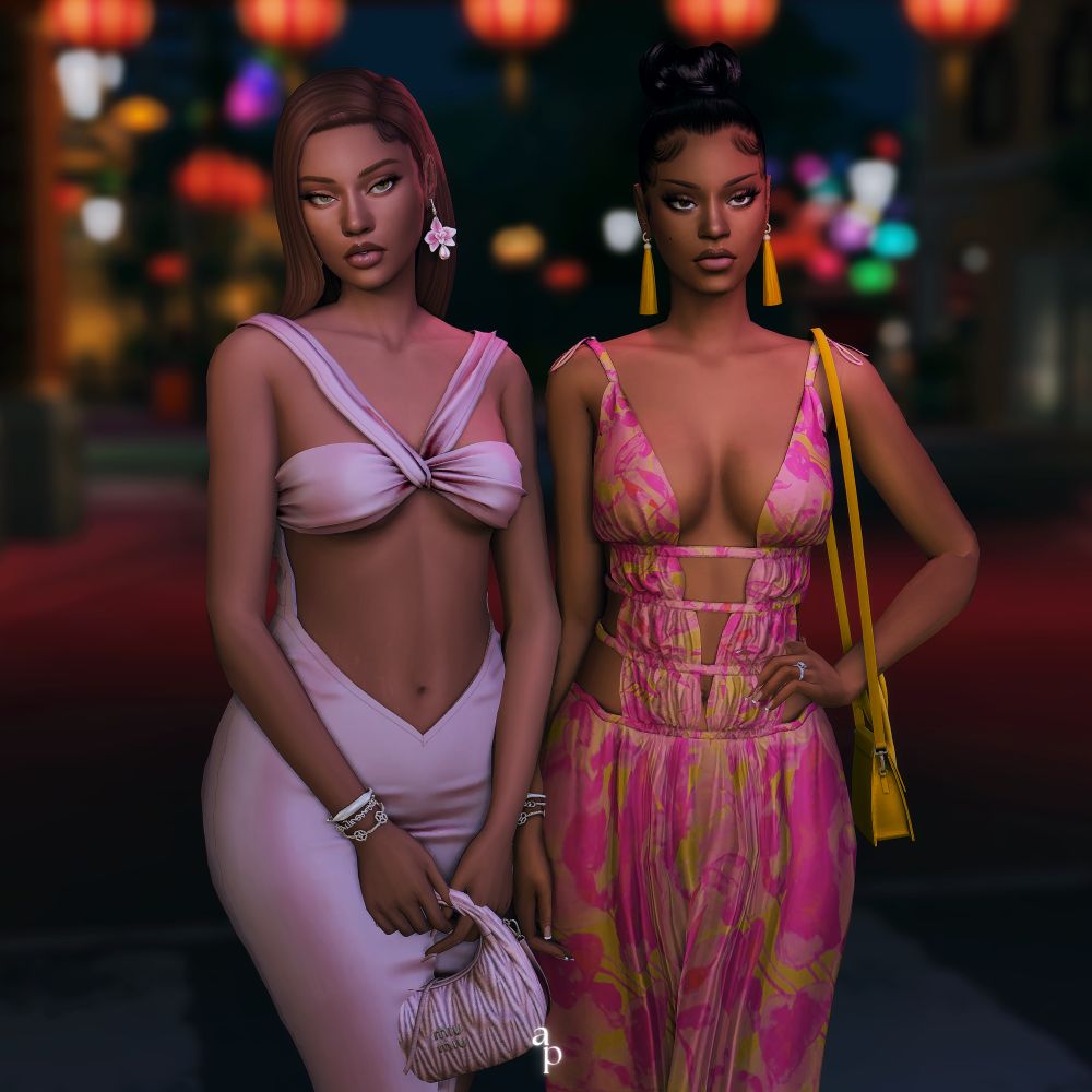 mimi & chasity posing for the camera.