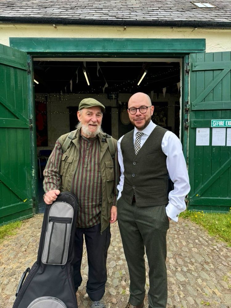 Performers Dave McFadzean and Kris Haddow outside the barn at Ellisland Farm.