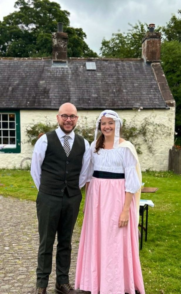 Kris and Siobhan in traditional dress outside Ellisland Farmhouse.