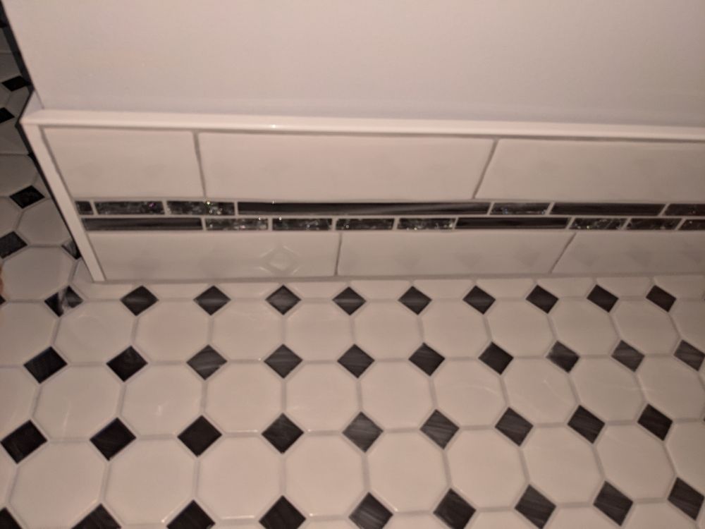 Detail showing the base tile work.