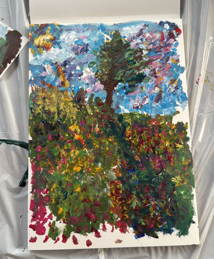An amateur painting of a tree in a tulip field