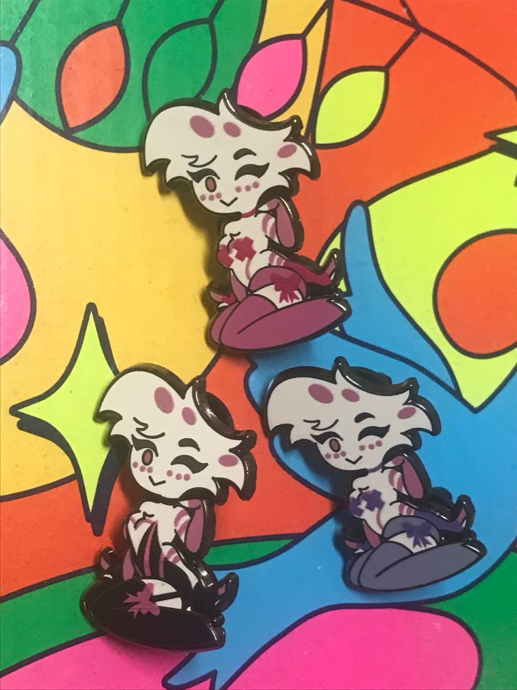 3 Angel Dust Gacha Pins from Hazbin Hotel, by @boca-al-lupo.bsky.social 