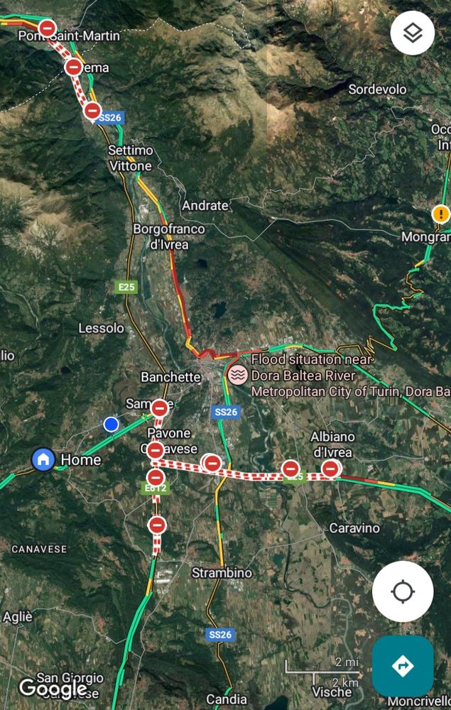 Google Maps screenshot showing a flooding alert, motorways and minor roads closed and traffic jams on the few open ones, near Ivrea (Turin Province)