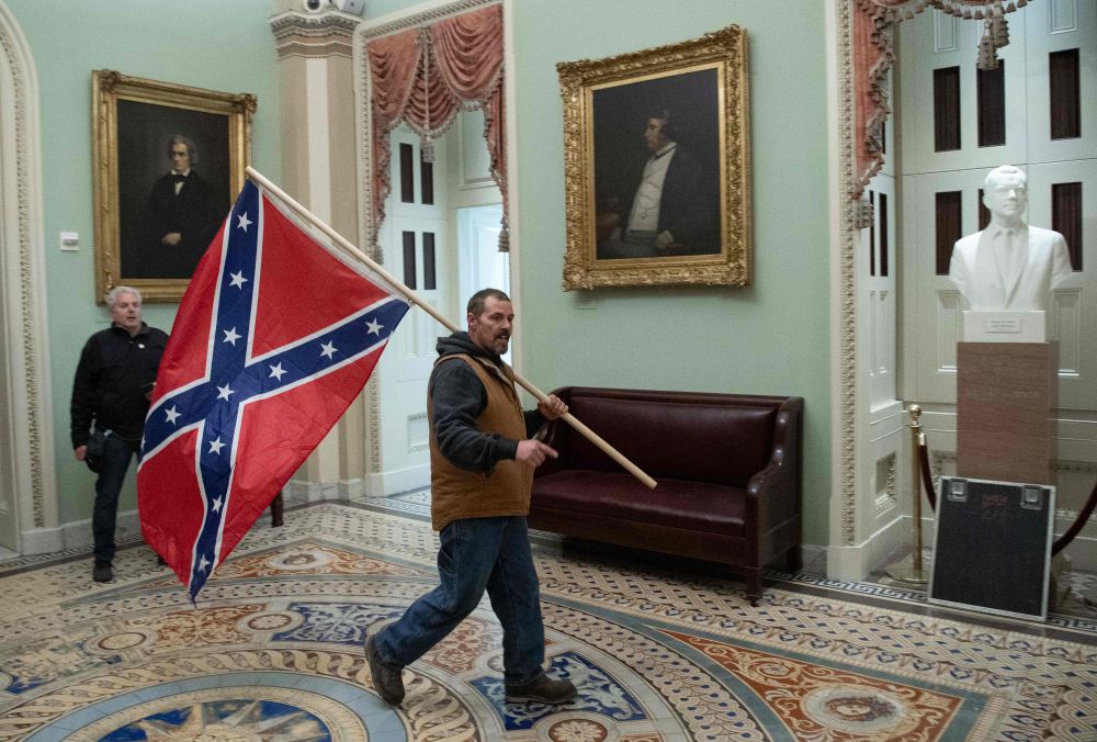 Jan 6th Trump led insurrection - the Capital building is invaded by Confederate traitors