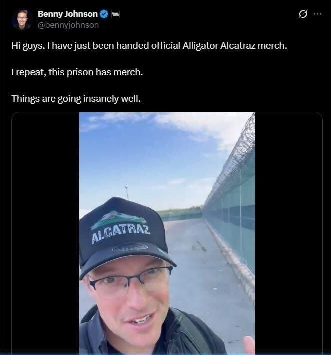 Human black hole Benny Johnson tweet: "Hi guys, I have just been handed official Alligator Alcatraz merch. I repeat, this prison has merch. Things are going insanely well." With a picture of Johnson in front of the Everglades detention camp wearing an Alligator Alcatraz baseball cap.