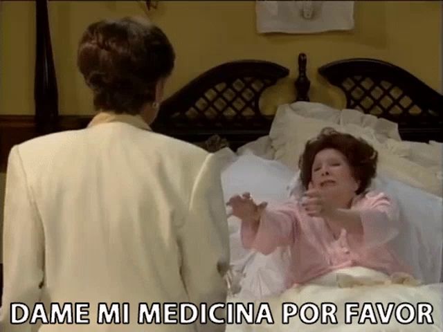 a woman laying in a bed with the words dame mi medicina por favor on the bottom