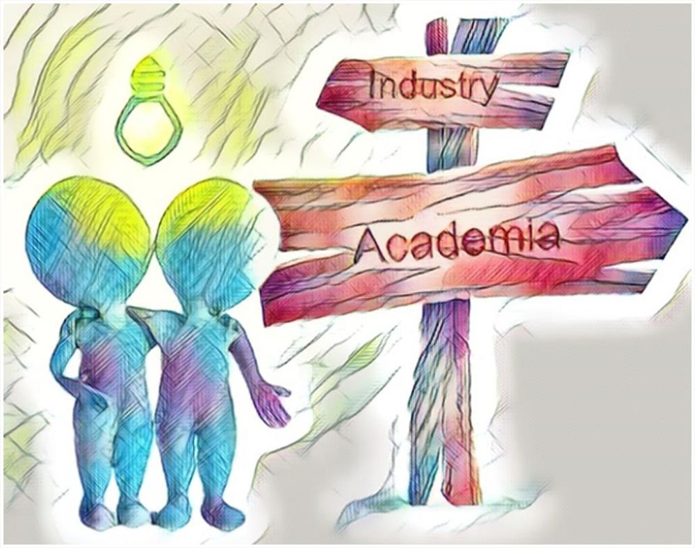 Two people standing at a crossroads with signs for Industry and Academia pointing at opposite directions.
