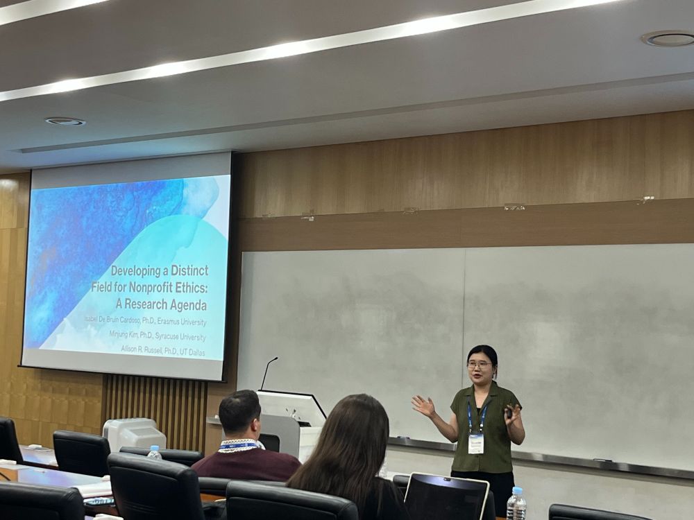 A student shares a conference presentation