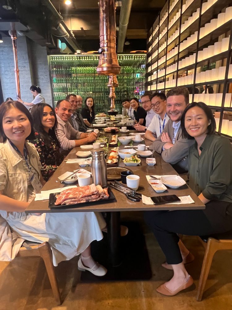 Students and faculty celebrate after the conference