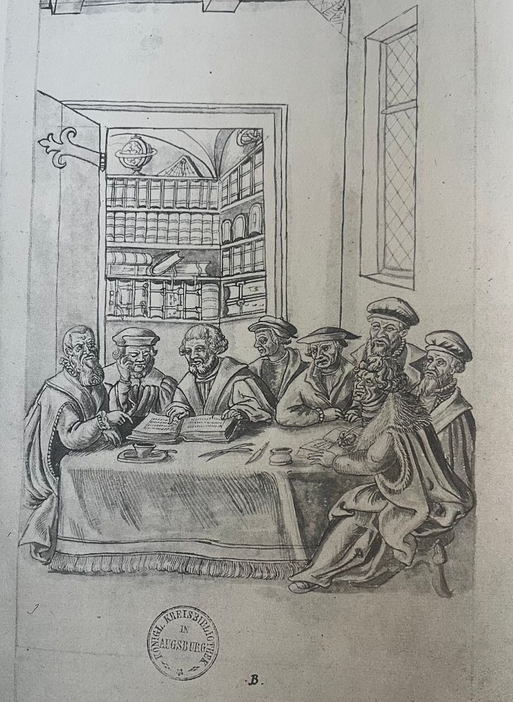 8 men sitting in a room, in the back is a library. The drawing is from a Latin manuscript from Reginbald Moehner "Epitomae rerum Suevicorum" that is nowadays in the Staats- und Stadtbibliothek Augsburg (2° Cod. 371). The image is from page 13r and maybe shows the Nuremberg Humanist Willibald Pirckheimer. 