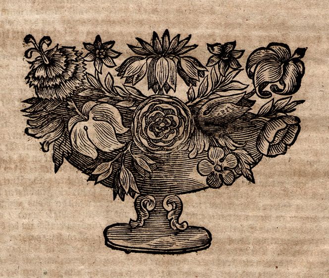A detail from a 1697 German almanach: printed flowers made with a woodblock and positioned in a Schreibkalender VD17 7:700977V.