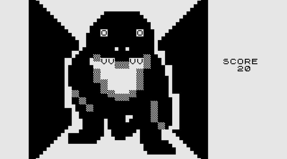 A screenshot of the Timex Sinclair game 3D Monster Maze, showing a crude black-and-white pixel-art image of a T-Rex in a labyrinth, made of black and gray squares, with Os for eyes and Vs for teeth. Text on the right reads “SCORE 20”