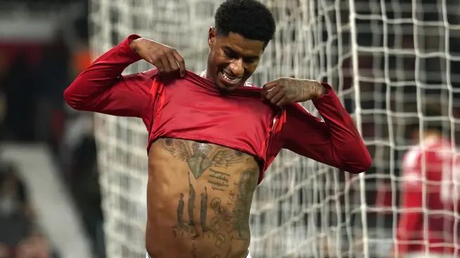 Marcus Rashford's abdomenal tattoo depicting the Black Power salute at the 1968 Olympics in Mexico City