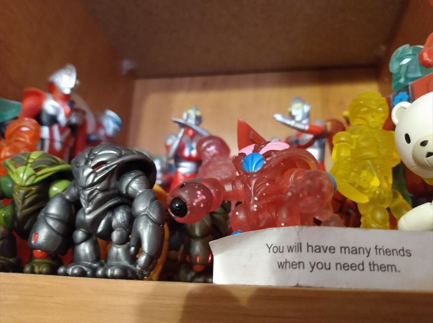 "You will have many friends when you need them" in front of crayboth and other Glyos system figs and Ultramen, oh and a bear guy off to the right.  posts may show up hear after Twitter, but you get the Alt text/ additional commentary here