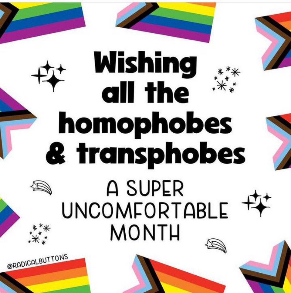  A bold, cheeky graphic with Progress Pride flags in each corner and sparkles scattered around. The central text reads: “Wishing all the homophobes & transphobes A SUPER UNCOMFORTABLE MONTH.” The Instagram handle @RADICALBUTTONS is written at the bottom left. The tone is unapologetically queer and defiant in celebration of Pride Month.