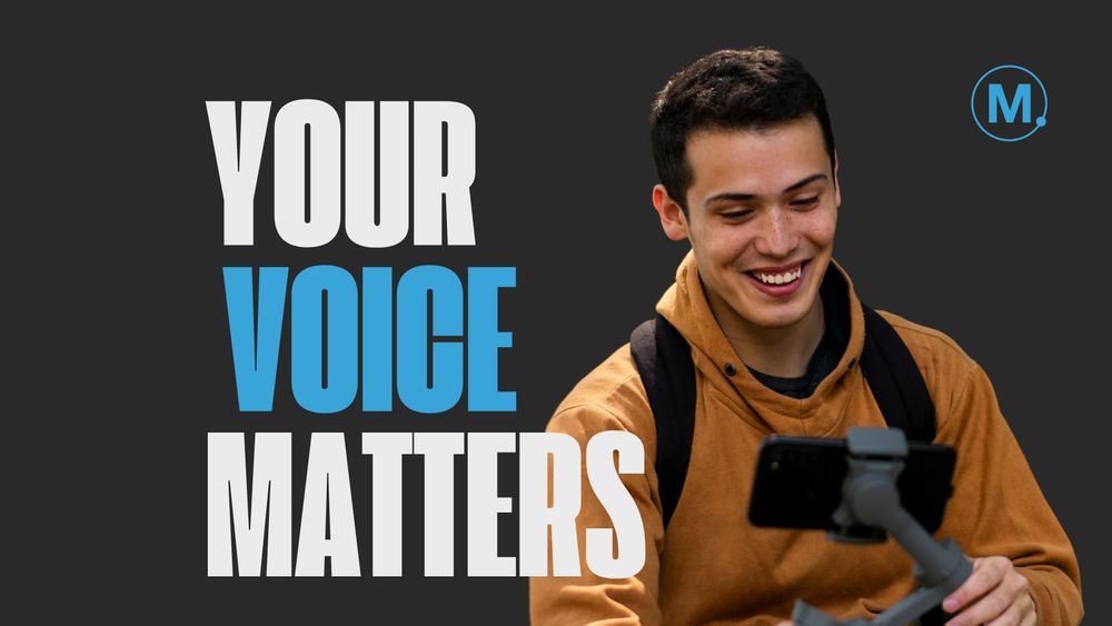 Dark background image with the text 'Your voice matters' in white and blue with a man in his 20s in a tan coloured hoodie with a iphone on a selfie stick with the MIDiA research logo in the top right corner.
