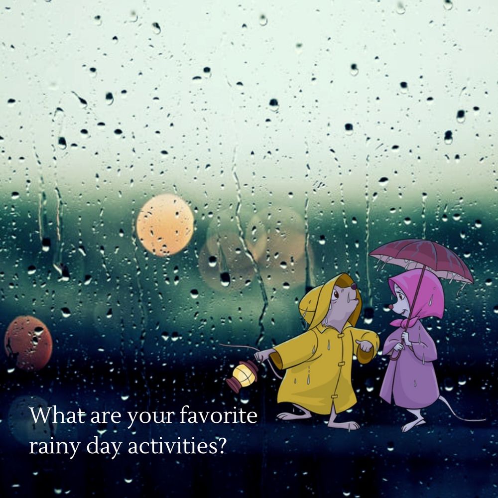 Photo of rain against window glass. There is an illustration of Bernard and Bianca, the mice from the Disney movie “The Rescuers,” wearing rain clothes and holding an umbrella. Text in the bottom left corner reads “What are your favorite rainy day activities?” 