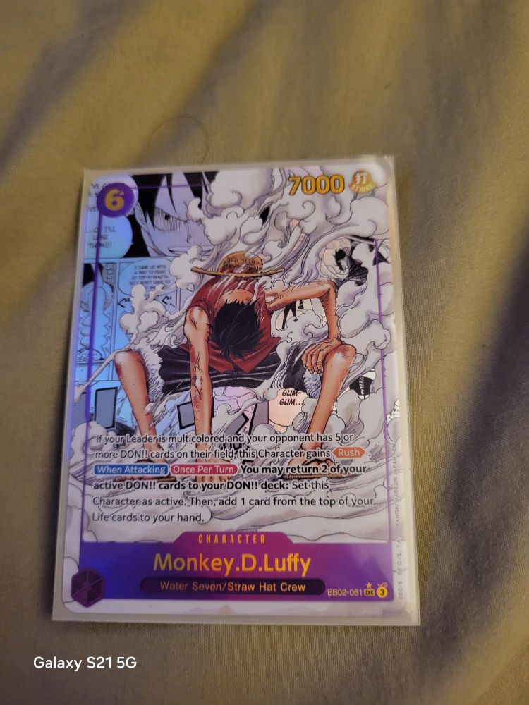 A one piece card featuring the character monkey .D Luffy