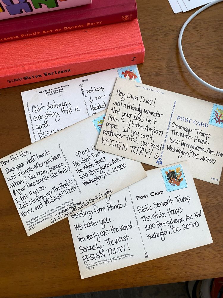A group of 4 postcards, all with increasingly hilarious and insulting messages to Trump.