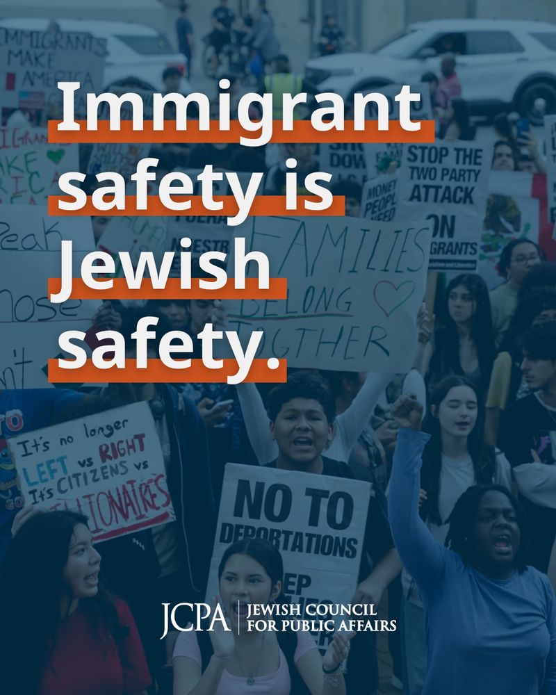 A protest scene with a diverse group of people holding signs in support of immigrant rights. Prominent signs read “NO TO DEPORTATIONS,” “FAMILIES BELONG TOGETHER,” and “It’s no longer LEFT vs RIGHT, it’s CITIZENS vs BILLIONAIRES.” Overlaid text reads: “Immigrant safety is Jewish safety.” At the bottom, the logo of the Jewish Council for Public Affairs (JCPA) appears.