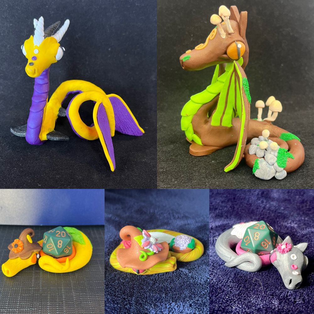 A collage of 5 polymer clay dragon sculptures. From top to bottom and left to right: 

A merdragon in the nonbinary flag colors with a yellow body, purple belly scales and tail fins, white eyes, and black and white twisted horns

A brown standing dragon with light green belly scales and wings, gold eyes and face details, bright green moss, granite rocks, and off-white mushrooms on the body and face

A yellow mini dice guardian with a brown hat with an orange flower, light green wings, orange eyes, and an orange die holder holding a green D20

A marbled light green and gold sleeping dragon with white wings, pink eyes, a terracotta-colored hat with green leaves/vines and a large purple and pink flower in the center, holding a miniature flower pot with green leaves and lilac-colored flowers

A mini dice guardian in the demi-girl flag colors with a silver body, white wings, a little pink flower on the ear, pink eyes, and a pink die holder holding a green D20